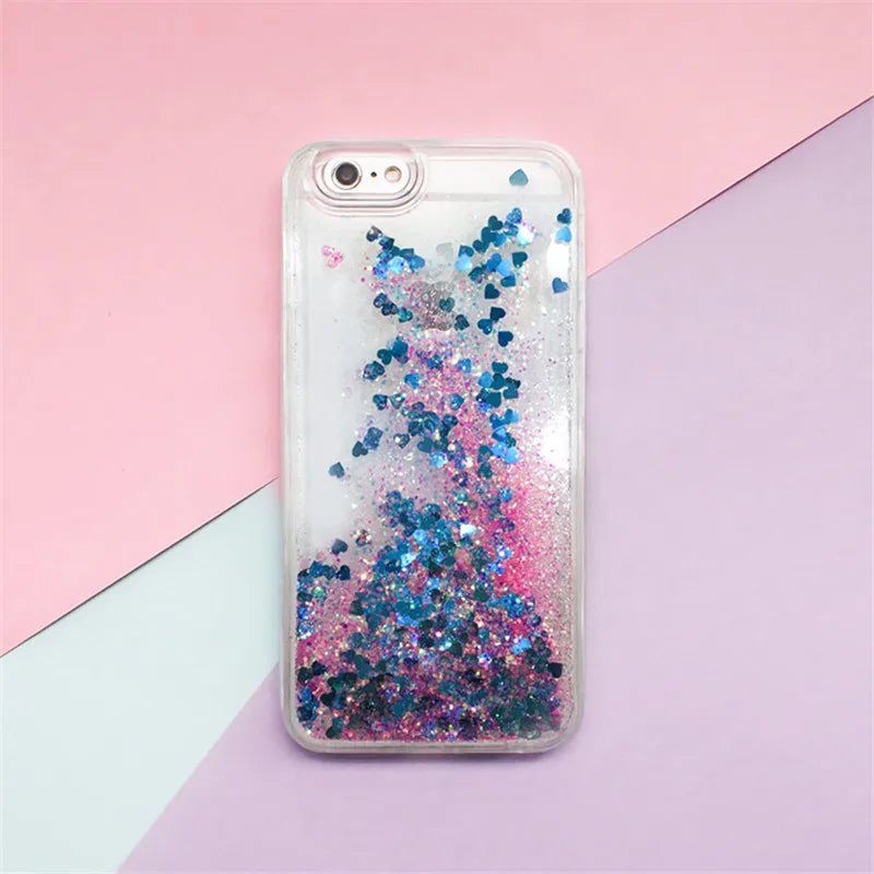Clear phone case filled with iridescent glitter and liquid effects, set against a pink and purple background.