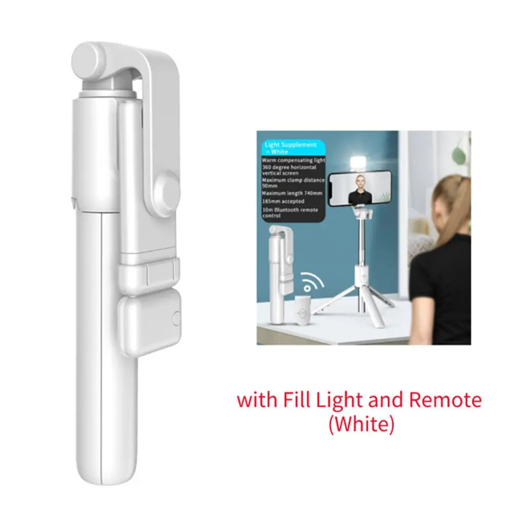 White extendable Bluetooth selfie stick with fill light and remote control shown next to a person.