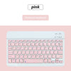 Rosa Bluetooth-Tastatur mit weißem Hintergrund