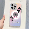 A holographic gradient phone case for an iPhone featuring a cross design and text.