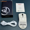 A black box, instructions, and a white wireless gaming mouse with RGB lighting are displayed on a dark surface.