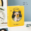A yellow photo card binder with a round window featuring a small dog and text that reads I'm cute oh Bear