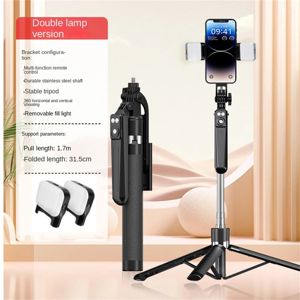 A black 360 degree rotation selfie stick with a smartphone mounted on top and a detachable grip is shown against a light back