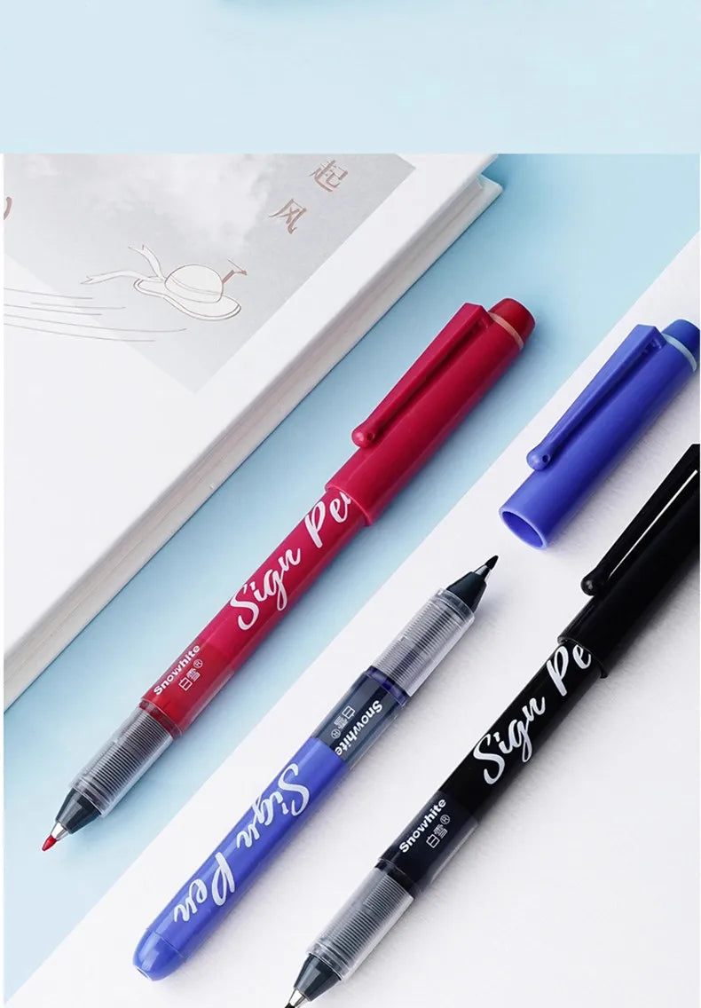 A red and blue signature pen is shown diagonally on a white background with a light blue surface.