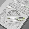 A precision set of transparent measuring tools including rulers, protractors, and calipers laid out on a white surface.