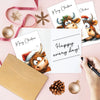 A collection of Christmas greeting cards featuring adorable Highland cow illustrations and holiday decorations.