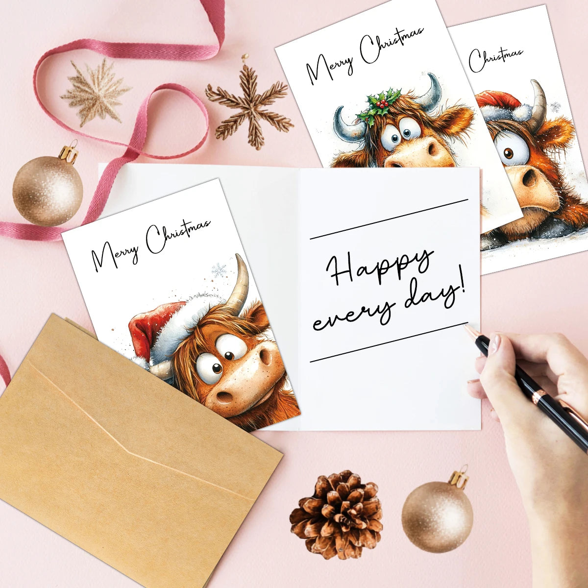 A collection of Christmas greeting cards featuring adorable Highland cow illustrations and holiday decorations.