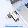 A Kodak 128GB USB 3.2 flash drive is shown next to a laptop, demonstrating a read speed of 120Mb/s.