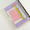 A set of ten zippered PVC binder pockets for A5 to A7 notebooks, featuring pink and yellow pens.