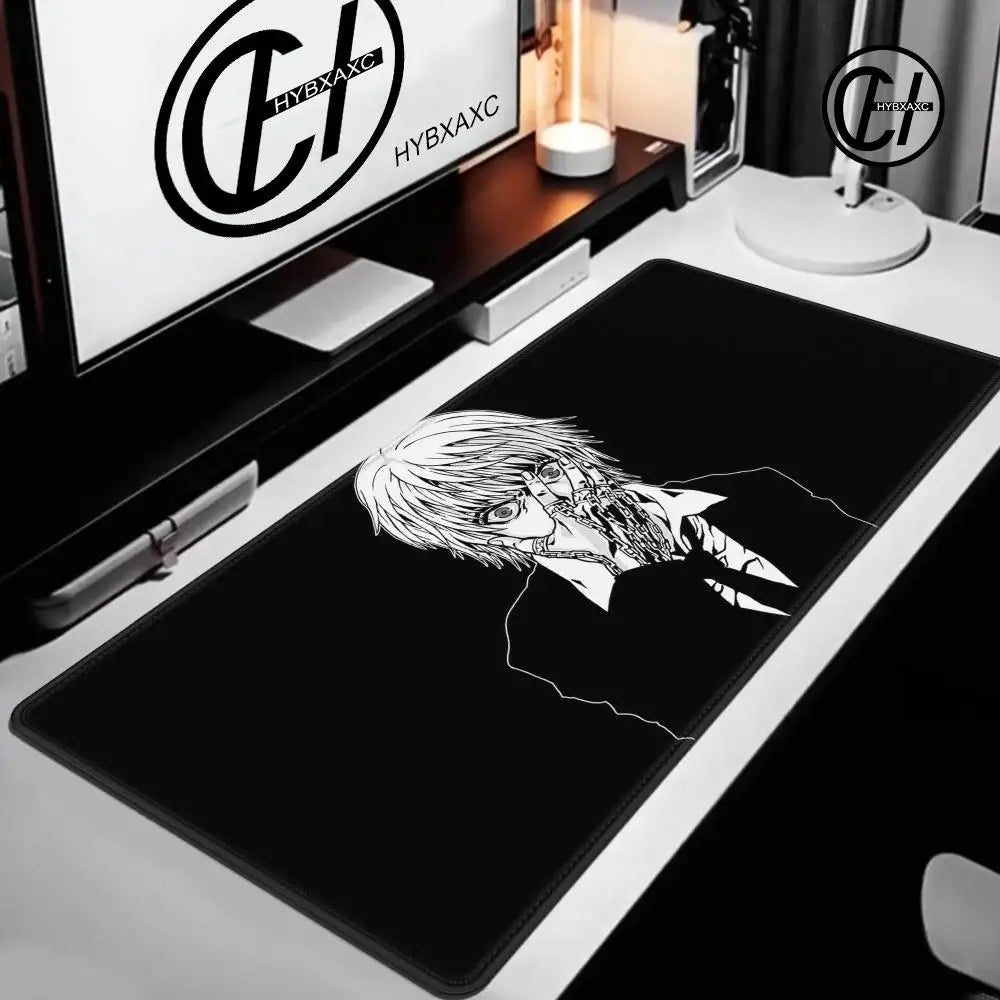 A black gaming mouse pad featuring a white line art drawing of an anime character's face.
