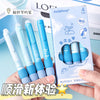 A hand holds a pack of blue gel pens with soft grips and a box, demonstrating the product.
