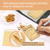 Self-adhesive seed envelopes being filled with seeds and written notes for record keeping