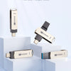 Various capacity Kodak metal USB flash drives in 32GB, 64GB, 128GB, 256GB, and 512GB options displayed on white stands.