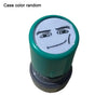 A rubber stamp with a funny meme face design and a green ink pad.