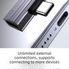 Close-up view of a silver USB-C to 3.5mm audio adapter connector on a device.