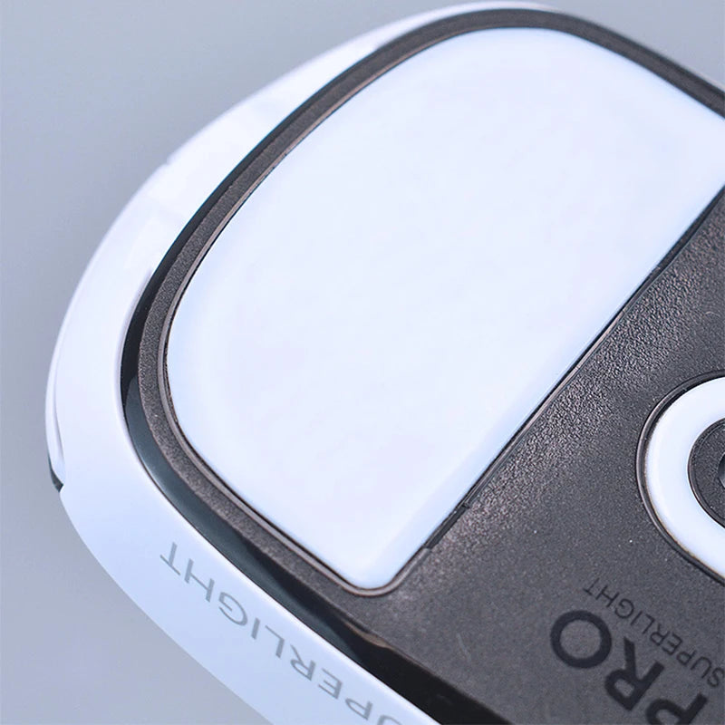 Close-up view of a white and black Logitech G PRO mouse skate product.