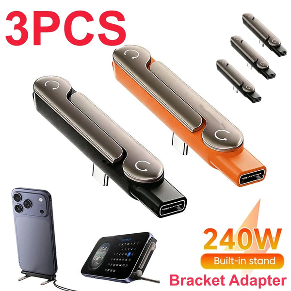 Three orange USB-C adapters with foldable stands and a black charging box adapter