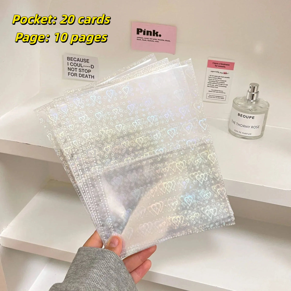 A stack of 20 clear photo sleeves and 10 pages labeled Pink for a binder collection