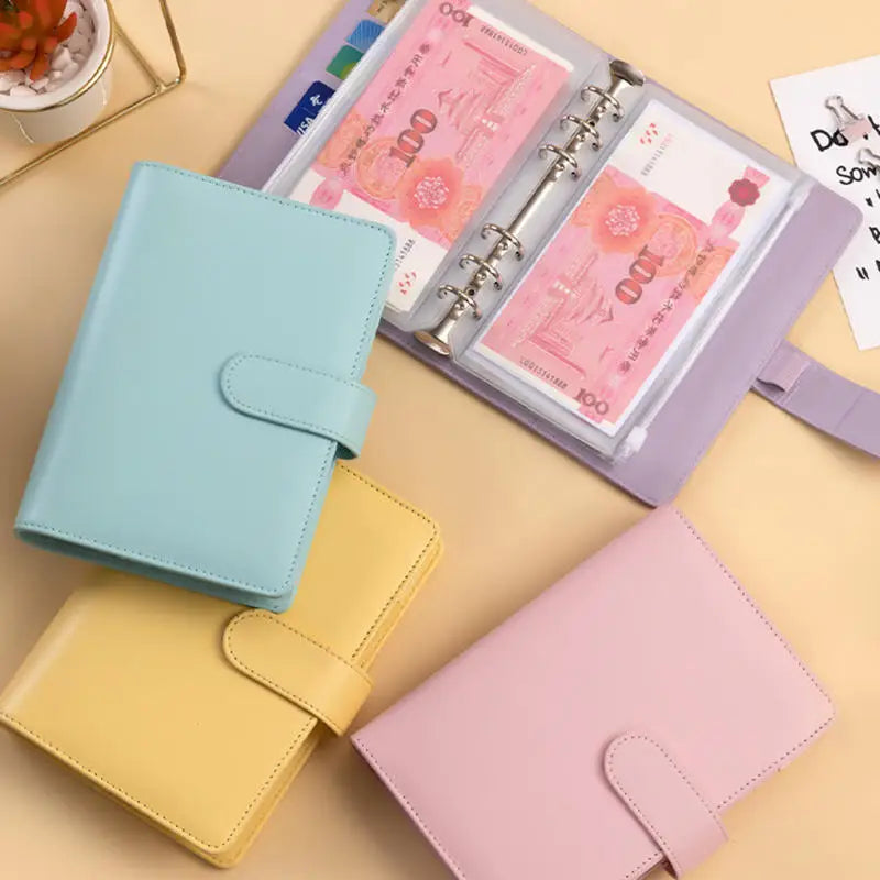 A set of colorful PU leather binders and cash envelopes displayed on a light background.