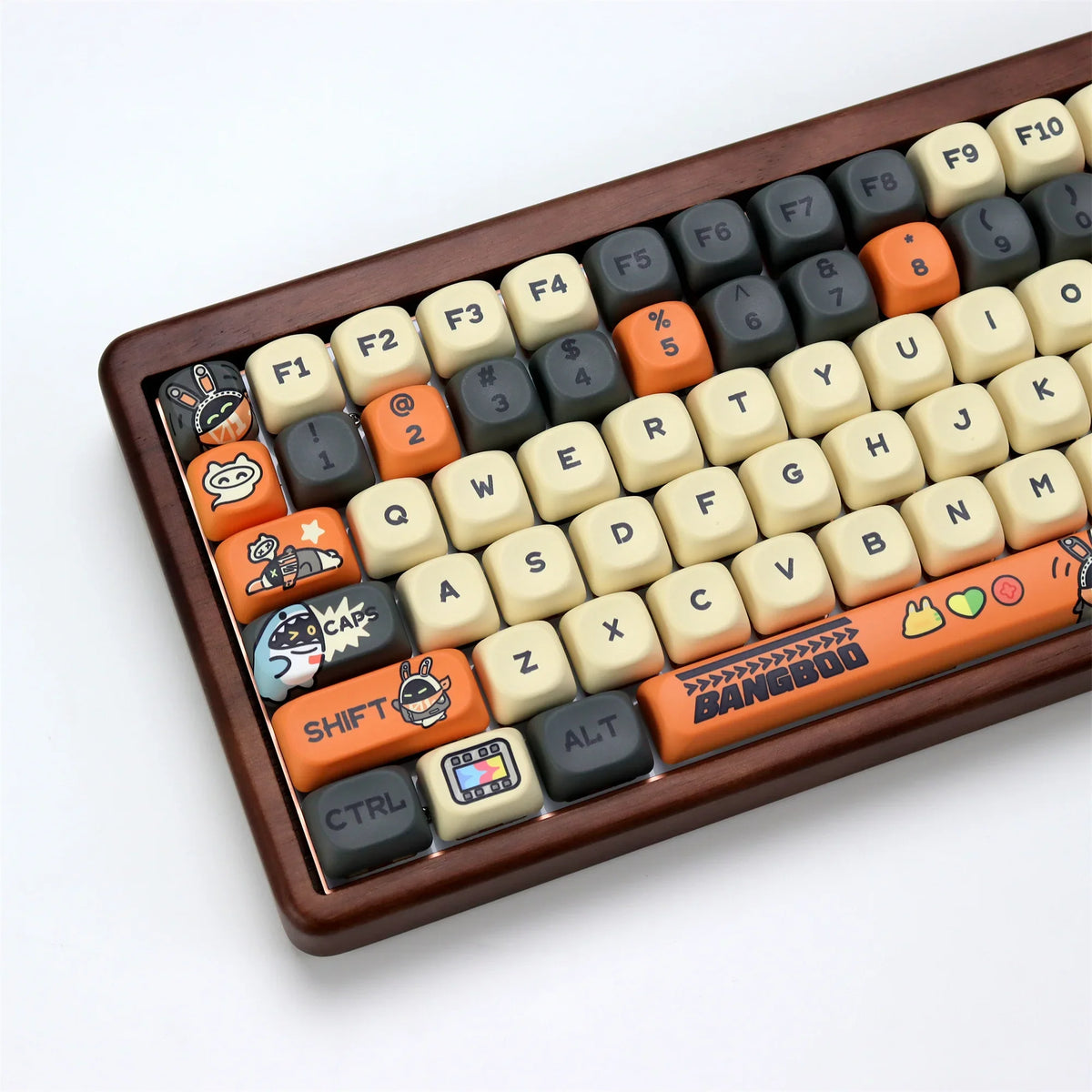 Close-up view of PBT keycaps for a mechanical keyboard in KOA profile featuring orange and gray colors.