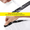 A hand is tearing open a black adhesive strip on a white poly mailer bag to access the contents.