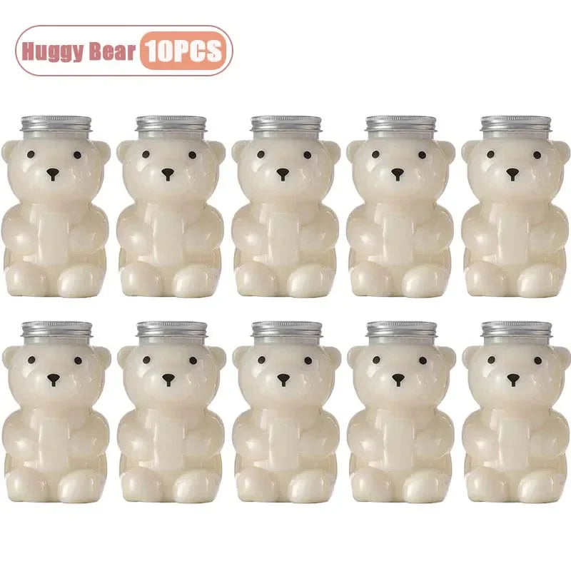 Ten white bear-shaped reusable water bottles with silver lids.