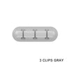 Gray silicone cable organizer with three clips for managing and winding cables.