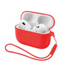 A red silicone earphone case with a strap is open, revealing two white earbuds inside.