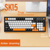 A close-up view of an SK15 true mechanical keyboard with orange keycaps and a white background.