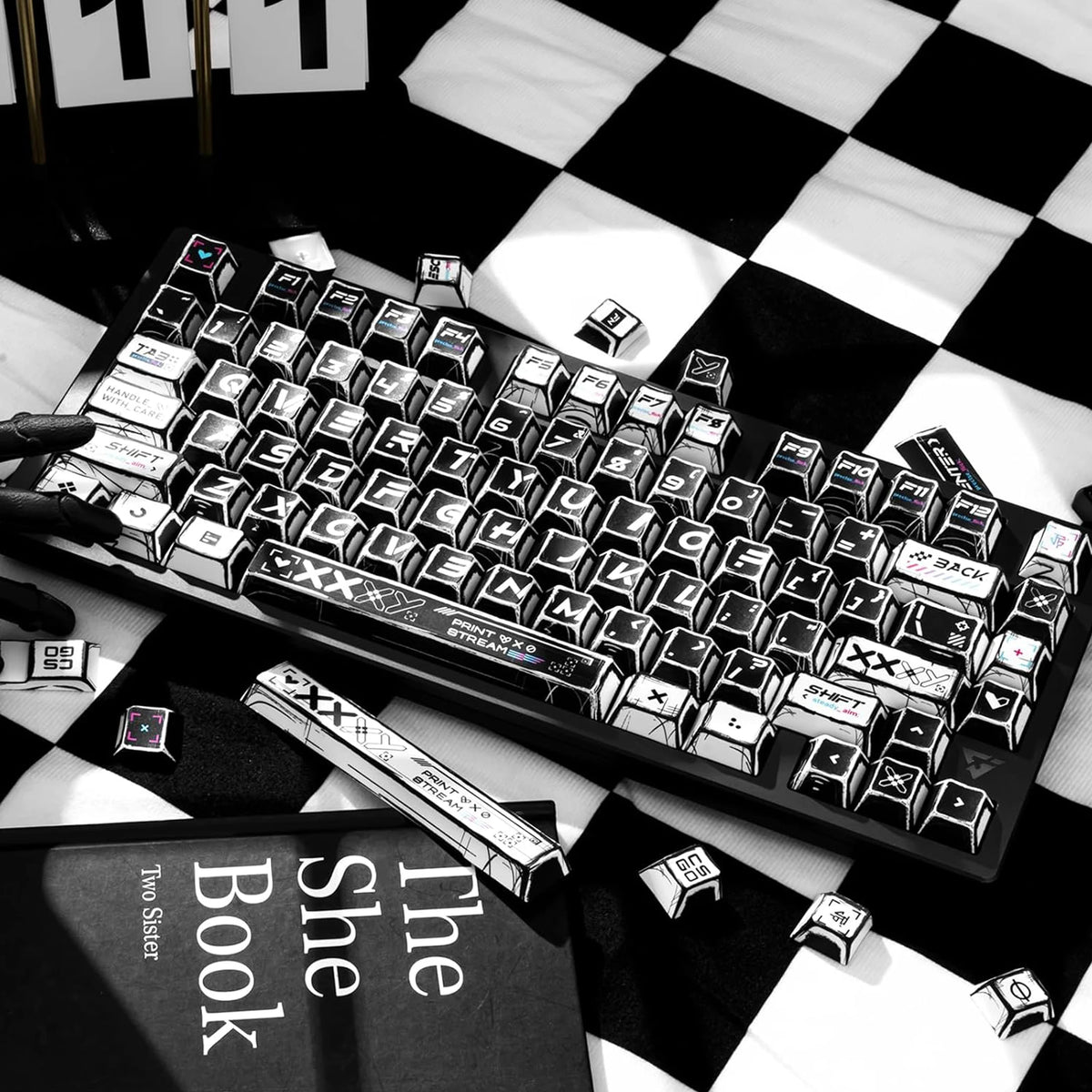 A close-up of a black mechanical keyboard with PBT keycaps, set against a black and white checkered background.