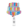 A colorful, glittery acrylic badge holder with the text Spread Kindness not germs.