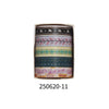 A roll of decorative masking tape featuring various patterns and text on a brown paper core.