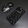 A black iPhone case featuring a leopard print pattern is shown next to the phone.