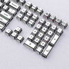 A close-up view of a set of translucent PBT keycaps with side printing in a cherry profile layout