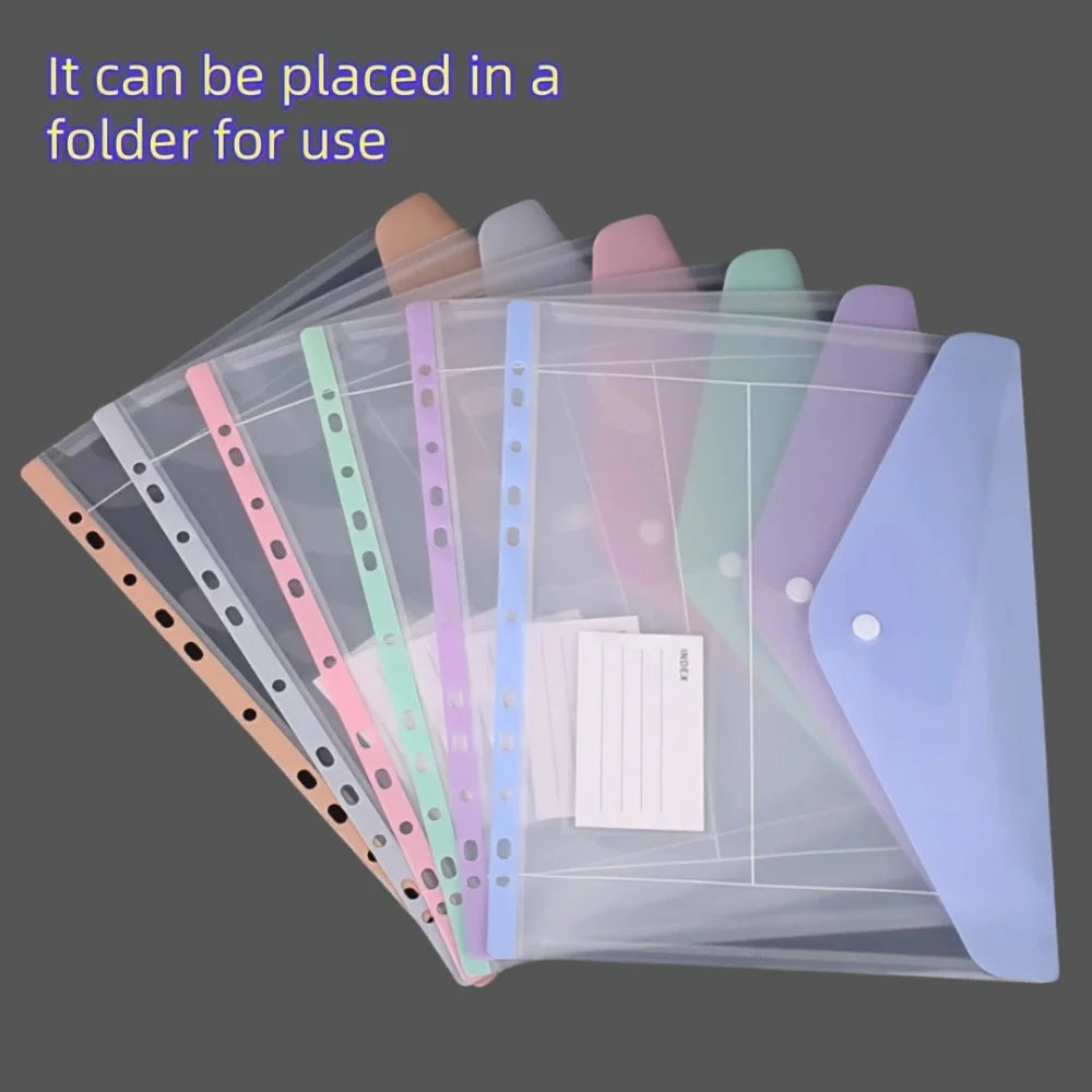 A collection of colorful, clear expandable binder pockets and plastic sleeves are displayed in a folder for use.