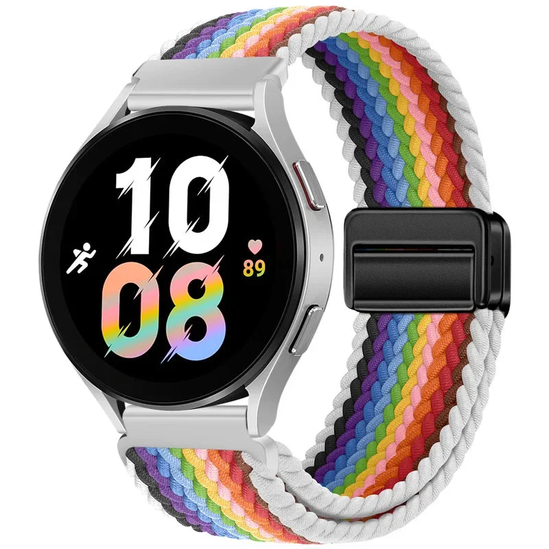 Silberne Smartwatch mit farbigem, gestreiftem Magnetarmband auf schwarzem Hintergrund