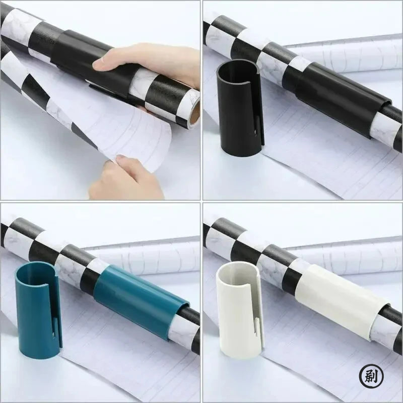 Portable mini paper cutting machine showing various rolls of black and white checkered paper.