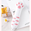 A white cat paw shaped utility knife with pink accents is shown resting on a white background.