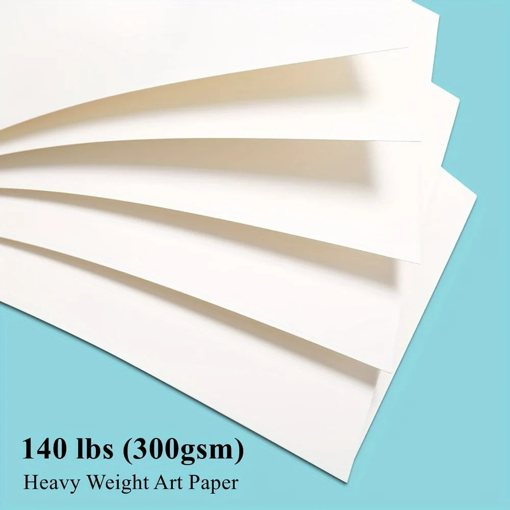A stack of white watercolor paper sheets angled diagonally against a light blue background.