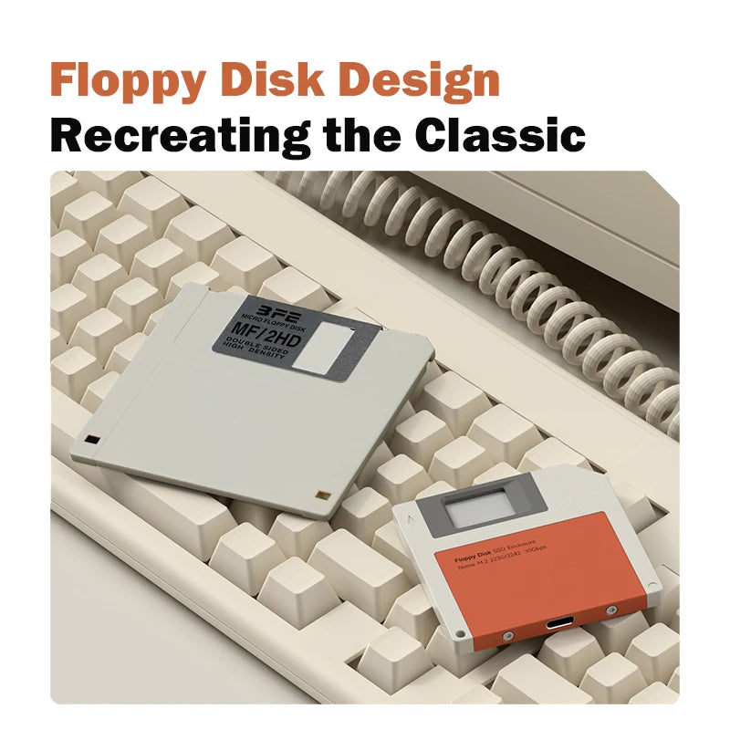 A silver M.2 NVMe SSD enclosure is shown resting on a textured surface, illustrating a floppy disk design concept.