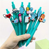 A hand holds a pack of six medical theme ballpoint pens featuring various healthcare symbols and designs.