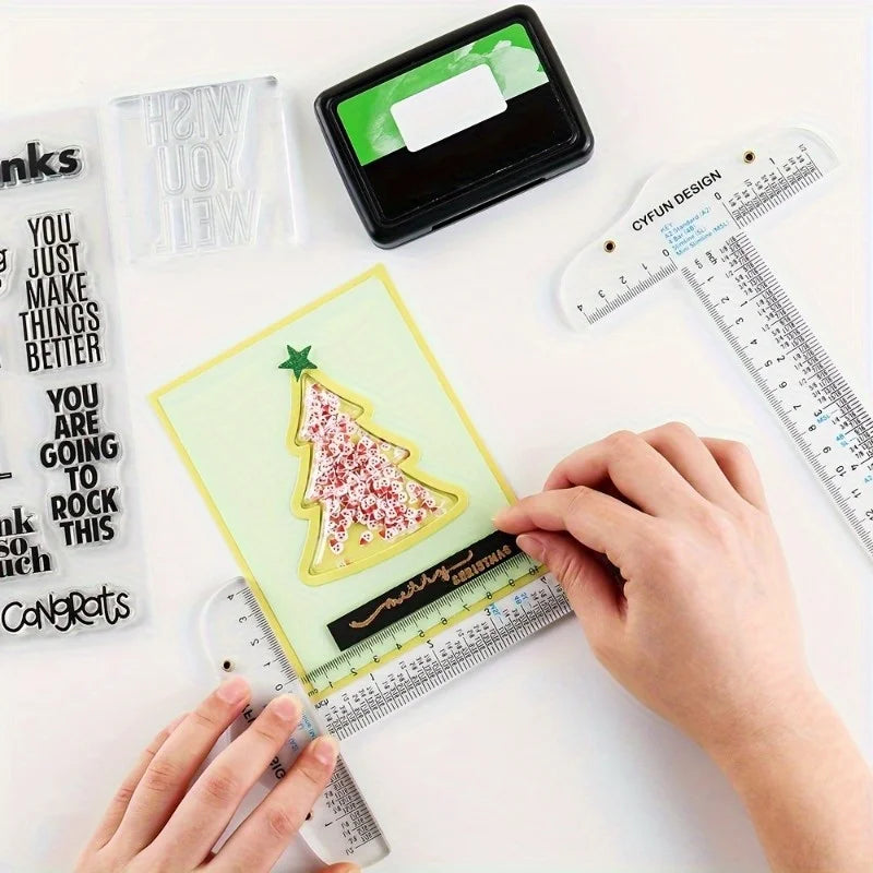 A hand measures a Christmas tree cutout with an acrylic T-square ruler set for crafting and measuring.