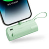 A light green compact power bank is shown next to a smartphone displaying 88% charge.