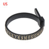 A black precision ring sizer and gauge tool with a numbered scale on the inner surface.