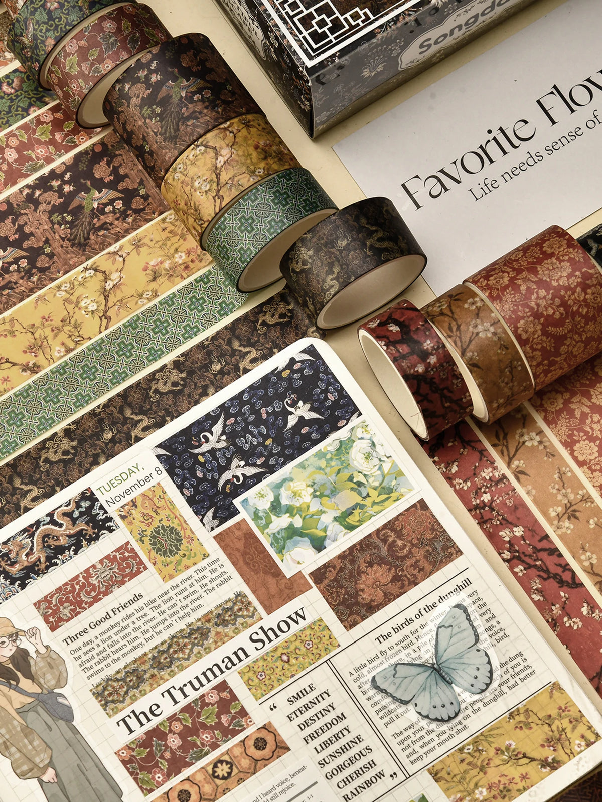 A collection of vintage floral washi tape rolls featuring various patterns and colors.