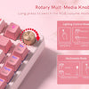 A close-up of a pink mechanical keyboard showing various keys and a rotary knob for switching lighting modes.