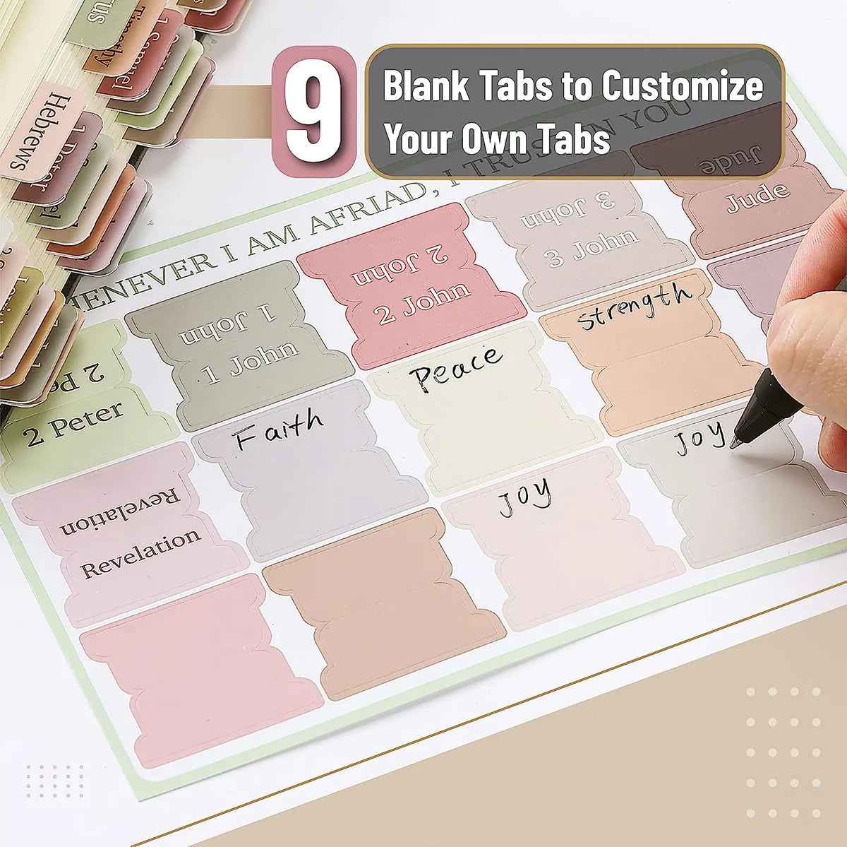A close-up of 9 blank tabs for customizing Bible tabs, showing various colors and text options like Judah, John, Peace, and F
