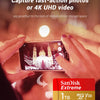 Hands hold a SanDisk Extreme microSDXC memory card, capturing a photo or video on a mobile phone.