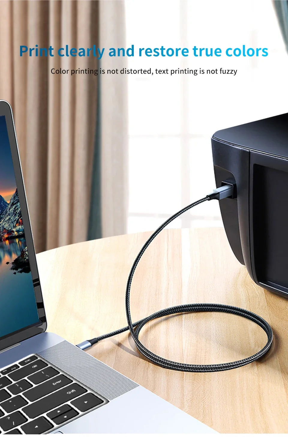 A black USB-C to USB-B printer cable is shown connected to a laptop, with a printer visible in the background.