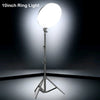 A 10-inch LED ring light mounted on a tripod stand with a boom arm, illuminating a dark background.